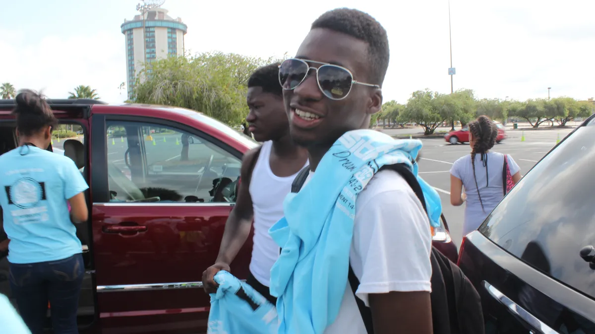 FYM youth smiling at a community outing